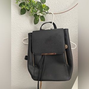 Gently used backpack purse